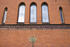 Spitzbogenfenster und Medaillon mit Wappen der von Bernstorff