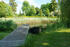 Bootssteg am Teich im Gutspark Landsdorf